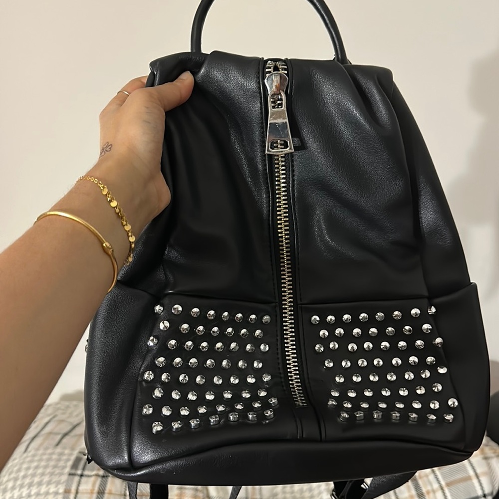 CARLOS by Carlos Santana studded backpack